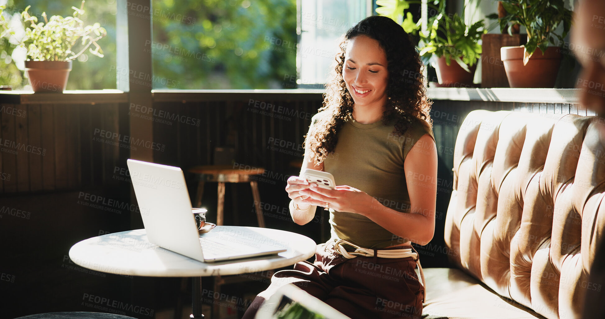 Buy stock photo Woman, phone and typing in coffee shop for remote work, trend research and conversation. Freelance person, laptop and chat in cafe for project, communication or social networking in small business