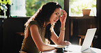Frustrated, woman and headache with laptop in coffee shop for mistake, remote work or stress. Tired, female person or freelancer with migraine or fatigue on computer for deadline or pressure in cafe