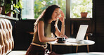 Frustrated, woman and headache with laptop in cafe for mistake, remote work or stress. Tired, female person or freelancer with migraine or fatigue on computer for deadline or pressure in coffee shop