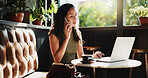 Woman, phone call and laptop in cafe for remote work, trend research and conversation. Freelance person, tech and chat in coffee shop for project, communication or social networking in small business
