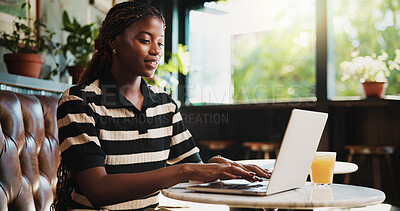 Buy stock photo Typing, online and happy woman with laptop in cafe, blog and freelance project on web or ad campaign. Copywriting, smile and black person with technology for article, remote work and creative in shop