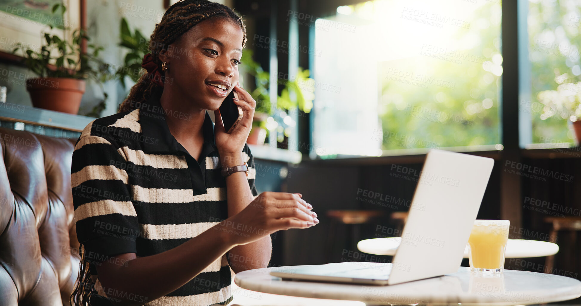 Buy stock photo Black woman, phone call and laptop in cafe for remote work, trend research and conversation. Person, tech and freelancer in coffee shop for project, communication or networking in small business