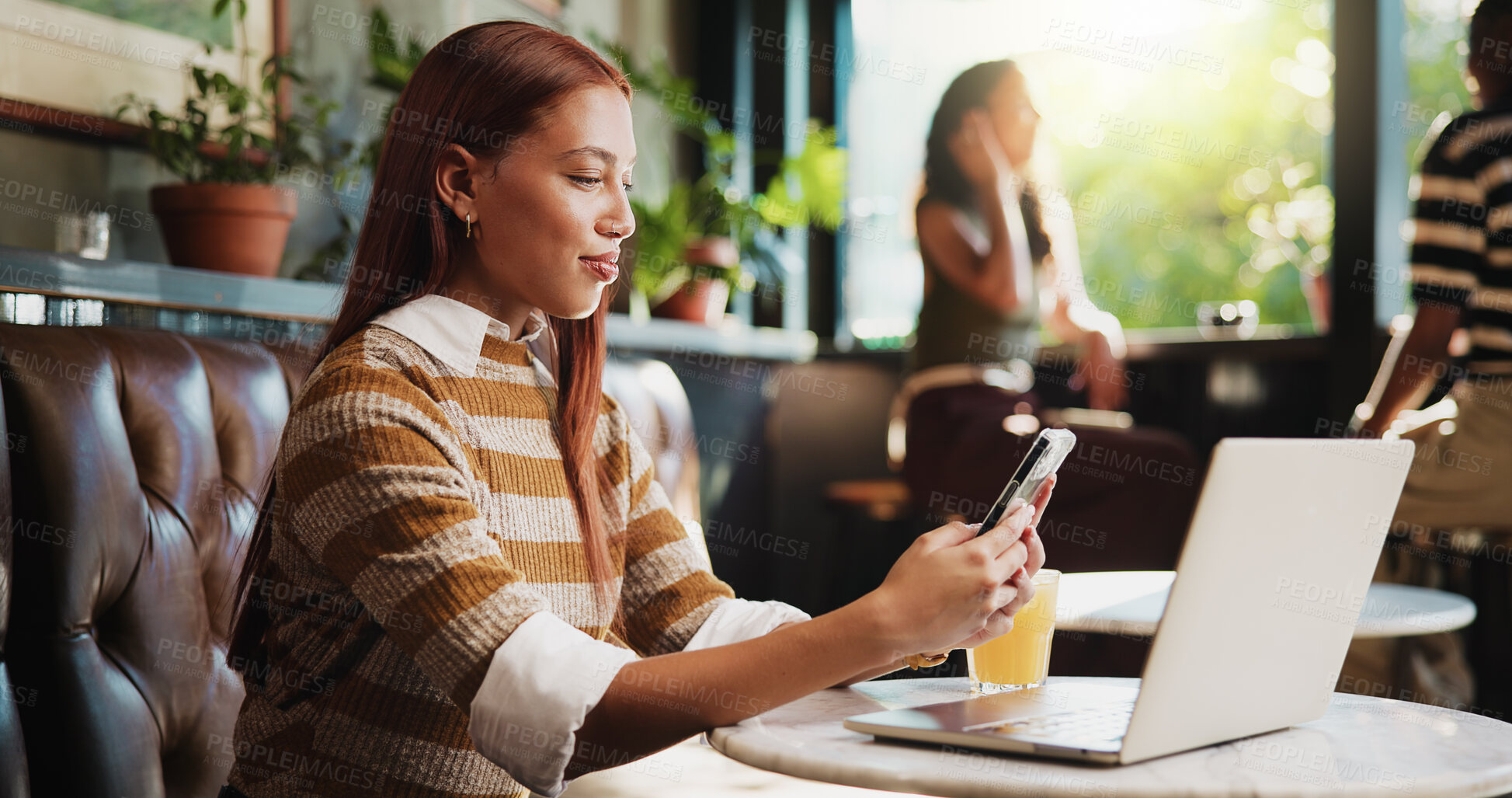 Buy stock photo Creative, smartphone and woman with laptop in cafe, copywriting or research for freelance assignment. Person, reading and article review on mobile, email marketing and remote work in coffee shop