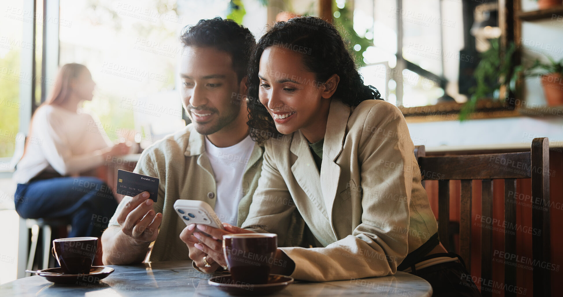 Buy stock photo Coffee, credit card and couple with phone in cafe with online shopping, ecommerce or order on app. Happy, warm beverage and man with woman on cellphone for purchase on website store in restaurant.