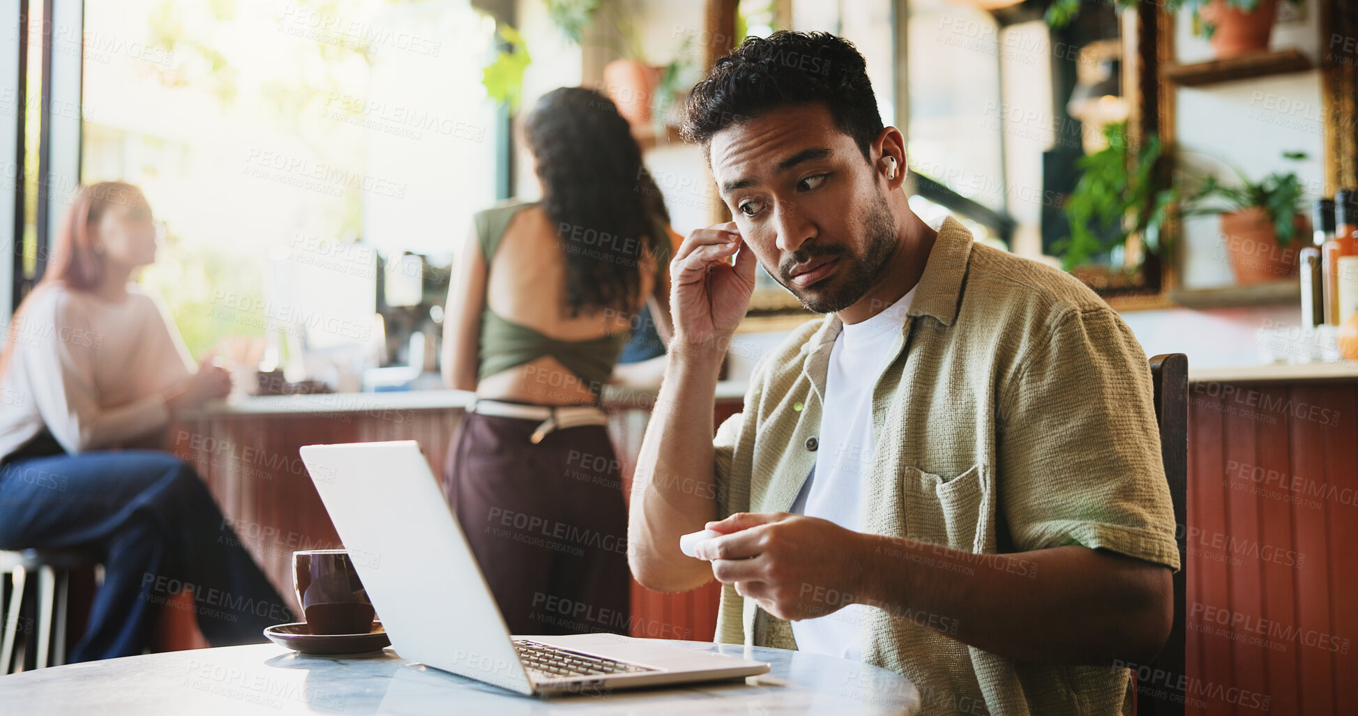 Buy stock photo Man, earphones and laptop in coffee shop for video, trend research and remote work. Person, audio tech and freelancer in cafe for project management, online tutorial or networking in small business