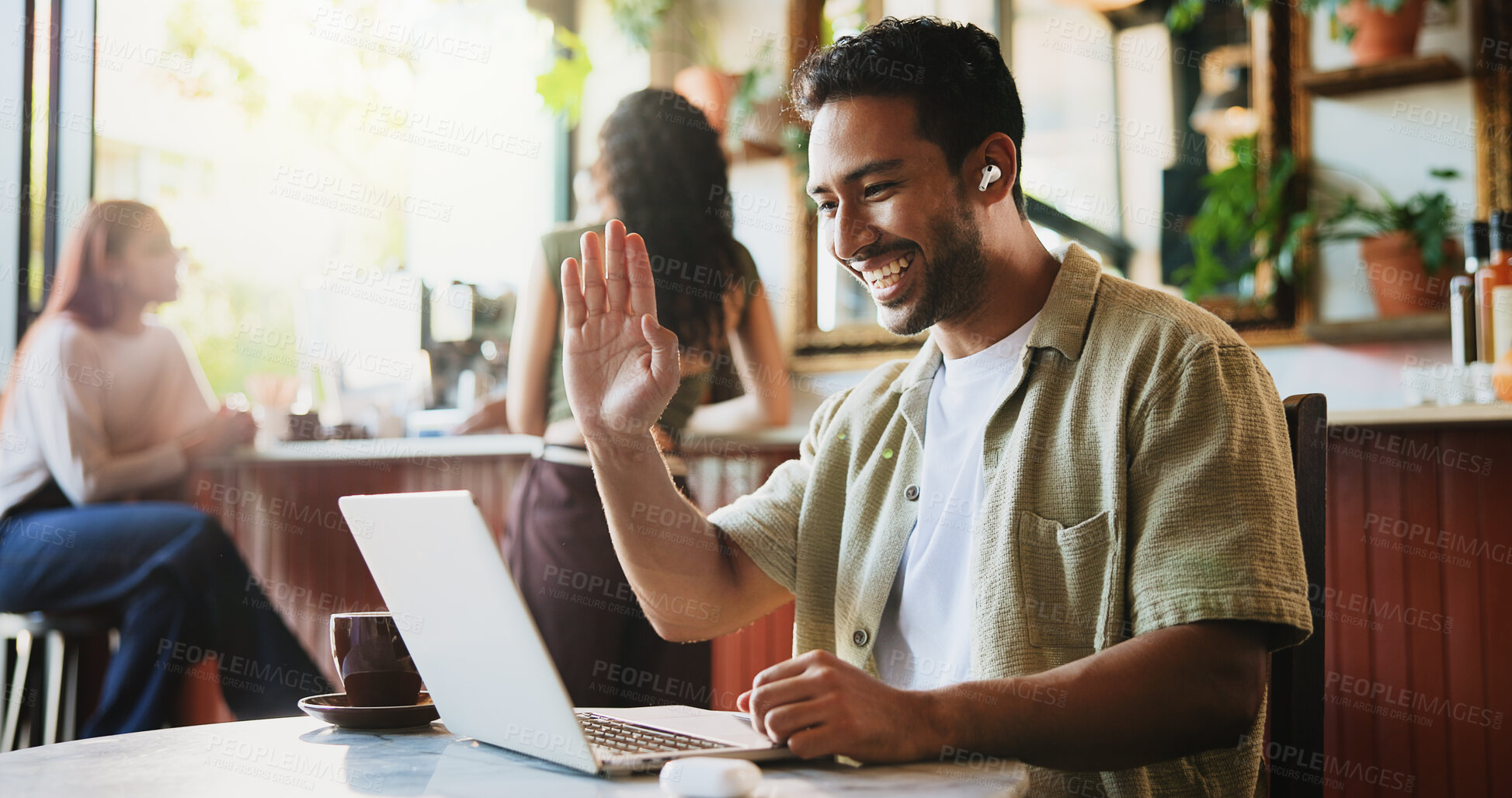 Buy stock photo Remote work, man and wave at laptop for video call, virtual lesson and language tutorial in cafe. Linguistics tutor, tech and online meeting in coffee shop for private consultation with earphones