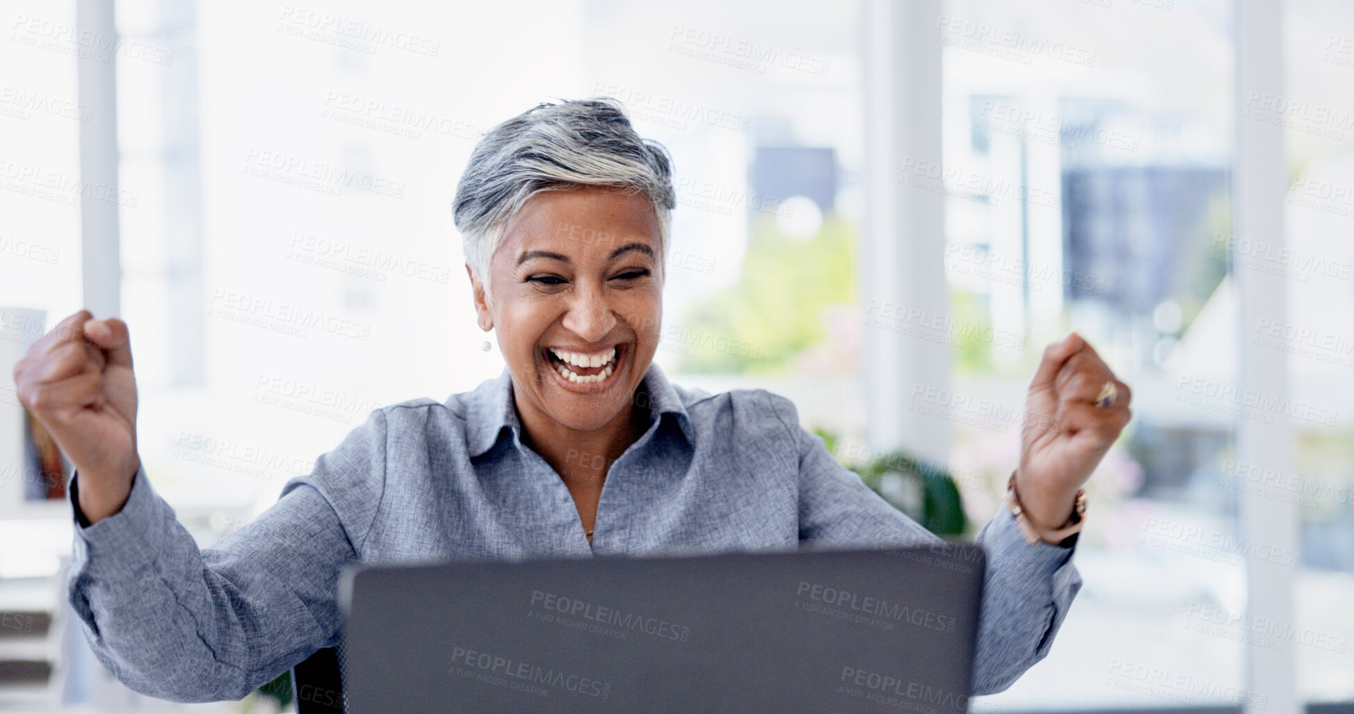 Buy stock photo Woman, laptop and celebration in office with smile, goals and success with project at investment company. Mature person, broker or happy with fist pump, pc or achievement with announcement at agency