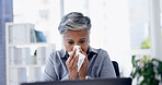 Illness, tissue and businesswoman blowing nose in office with  cold, flu or sinus infection. Sick, virus and mature female person with toilet paper for sneeze with allergies or hayfever in workplace.