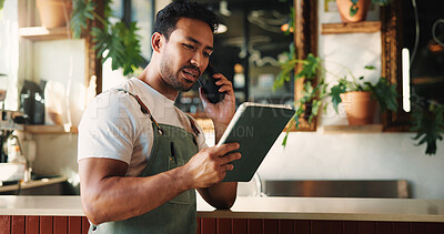 Buy stock photo Waiter, phone call and man with tablet in cafe for stock order, contact supplier or negotiation. Tech, coffee shop and talking with person in small business, inventory update and customer service