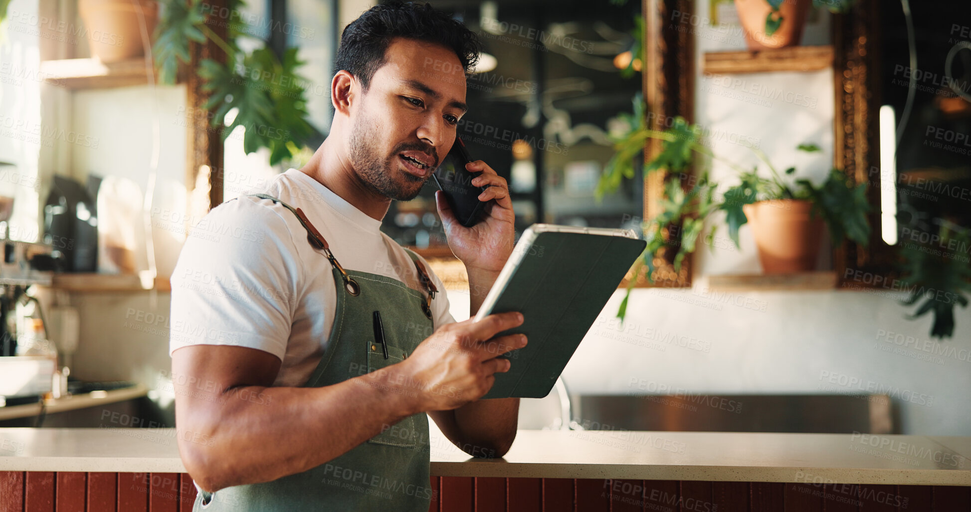 Buy stock photo Waiter, phone call and man with tablet in cafe for stock order, contact supplier or negotiation. Tech, coffee shop and talking with person in small business, inventory update and customer service