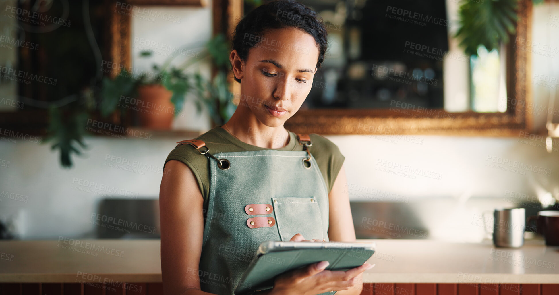Buy stock photo Hospitality, tablet and woman in cafe, internet and service for online order, email and startup website. Barista, entrepreneur or person in restaurant, tech for inventory or planning menu with apron