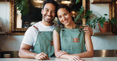 Buy stock photo Hug, portrait and smile of couple in coffee shop together for management or store ownership. Hospitality, proud and service with happy people embracing in restaurant cafe for small business startup