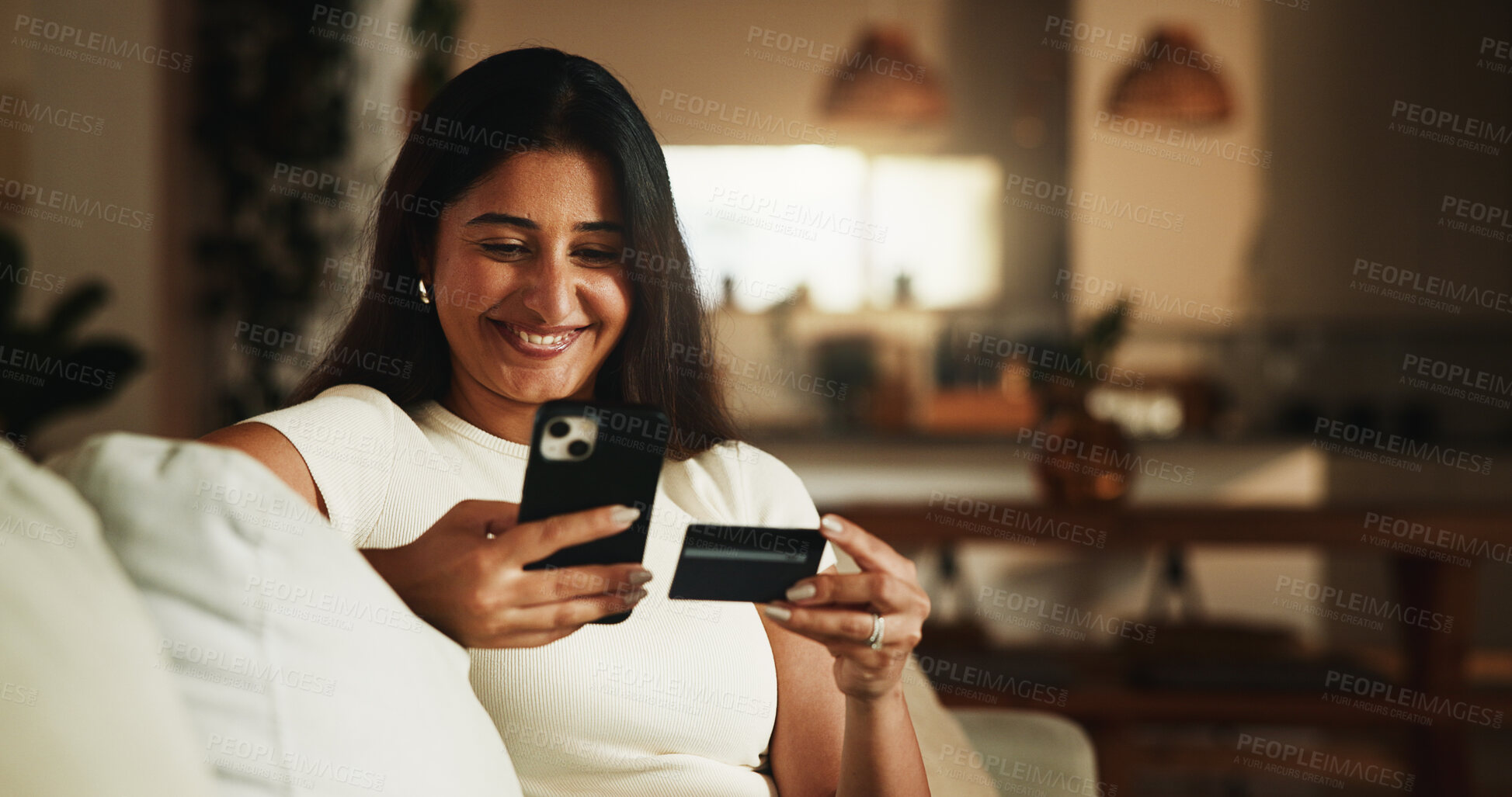 Buy stock photo Credit card, phone and smile with woman on sofa for online shopping, digital payment or fintech. Internet banking, account password and customer purchase with person in living room of home for order