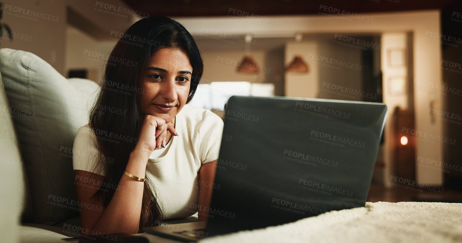 Buy stock photo Laptop, streaming and relax with woman on sofa in home for movie subscription, entertainment and calm. Film platform, weekend break and online show with female person in living room in apartment