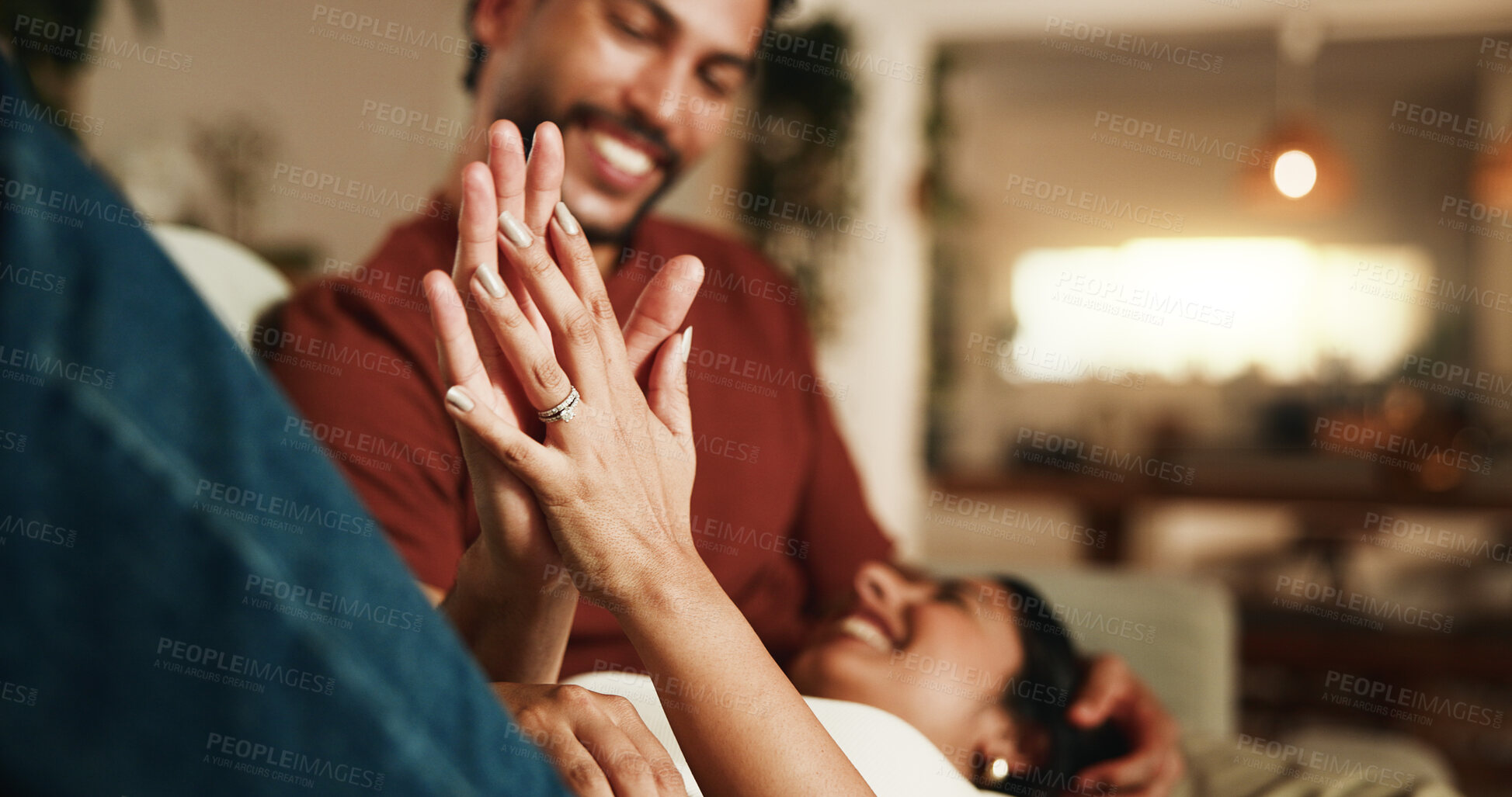 Buy stock photo Couple, relax and holding hands in sofa with love, romantic connection or bonding together on weekend. People, smile and rest in home with marriage commitment, loyalty and care for partner in lounge.
