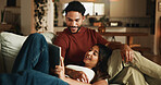 Happy couple, relax and tablet on sofa with bonding, meme and connection with funny video in living room. People, partner and relationship with tech, application or film streaming on web at apartment