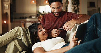 Buy stock photo Happy couple, relax and tablet on couch with credit card, talk and budget for online shopping in living room. People, partner and e commerce with tech, application and fintech on sofa at apartment