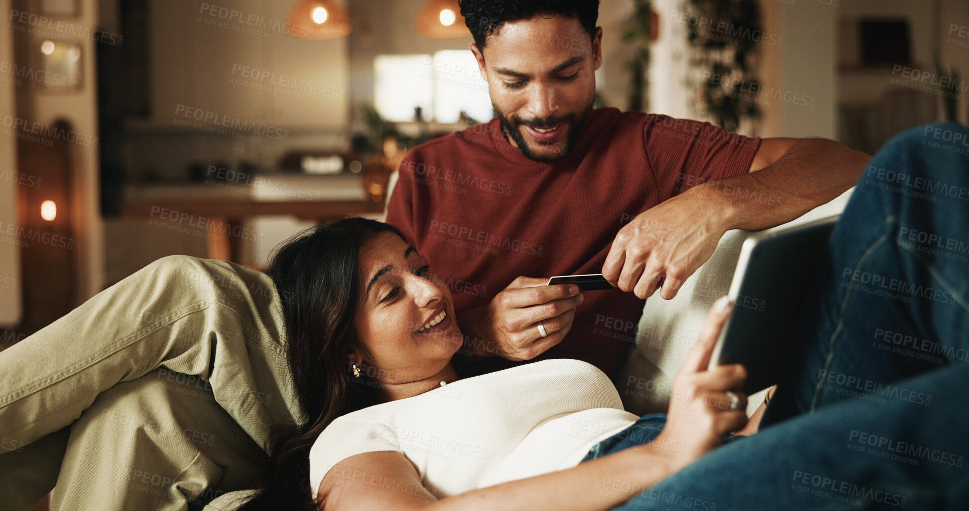 Buy stock photo Happy couple, relax and tablet on couch with credit card, talk and budget for online shopping in living room. People, partner and e commerce with tech, application and fintech on sofa at apartment