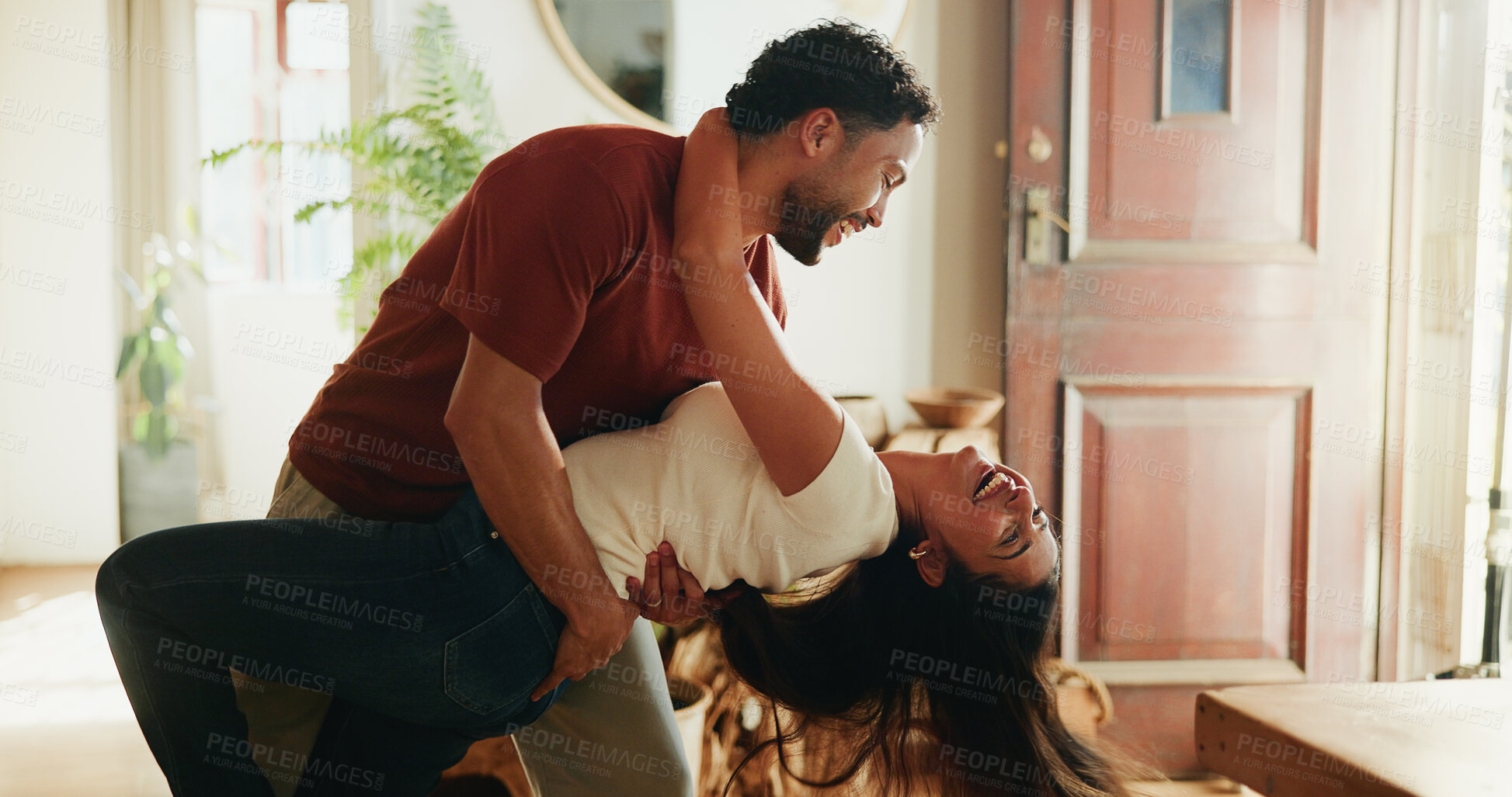 Buy stock photo Happy, couple and dip in home with dance, support partner or love bonding together on weekend break. People, smile and rhythm in living room with music, loyalty or connection for marriage commitment.