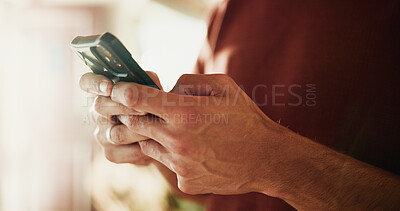 Buy stock photo Phone, typing and hands with man in home for communication, social media and contact. Virtual chat, connection and networking app with male person in apartment for news, update and online post