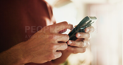 Buy stock photo Phone, texting and hands with man in home for communication, social media and contact. Virtual chat, connection and networking app with male person in apartment for news, update and online post