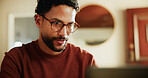 Man, research and glasses with laptop in home for remote work, schedule planning or project. Male person, freelancer or journalist on computer app for online article, journalism or digital writing