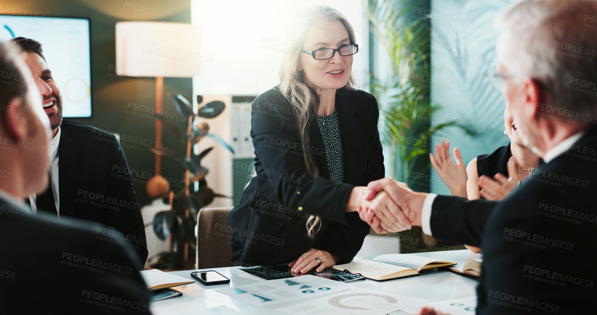 Buy stock photo Business people, meeting and handshake with applause for partnership, deal or agreement in office. Businessman, woman or employees shaking hands with smile or team for onboarding or b2b in boardroom