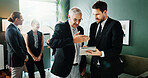 Tablet, team and business men with idea in meeting, investment advice and project feedback. Tech, manager and review in office for financial report, budget collaboration and planning in discussion