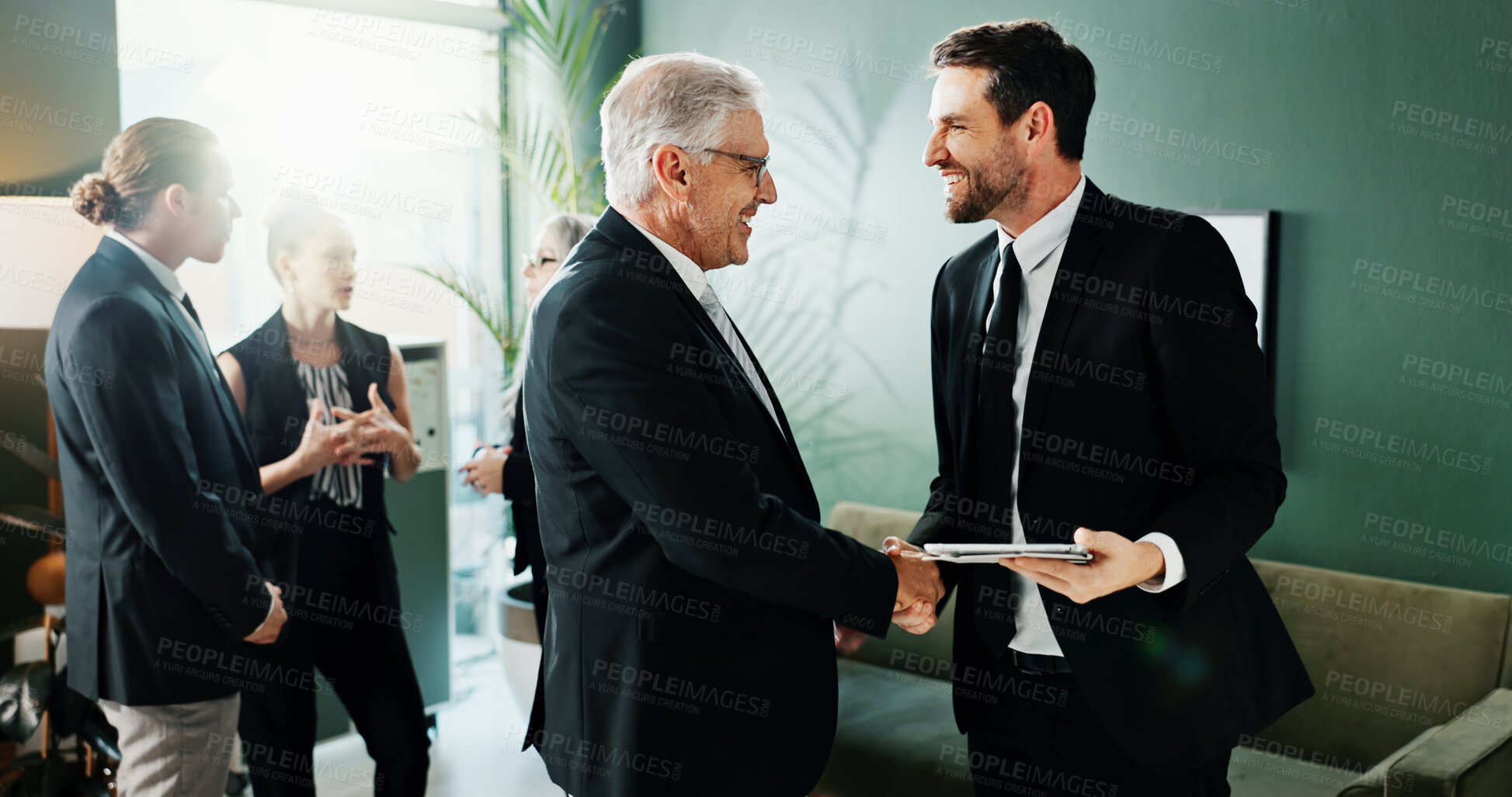 Buy stock photo Meeting, smile and business people with handshake in office, investment contract and b2b partnership. Flare, deal negotiation or employees shaking hands for agreement, tablet or venture collaboration