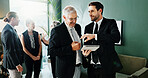 Tablet, team and business men planning in meeting, investment advice and project feedback. Tech, manager and review in office for financial report, budget collaboration and help in discussion