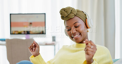Buy stock photo Home, dancing and happy woman with headphones for music, fun or playlist for entertainment in lounge. Streaming, audio and black person with tech for radio, relax and listening to song in apartment