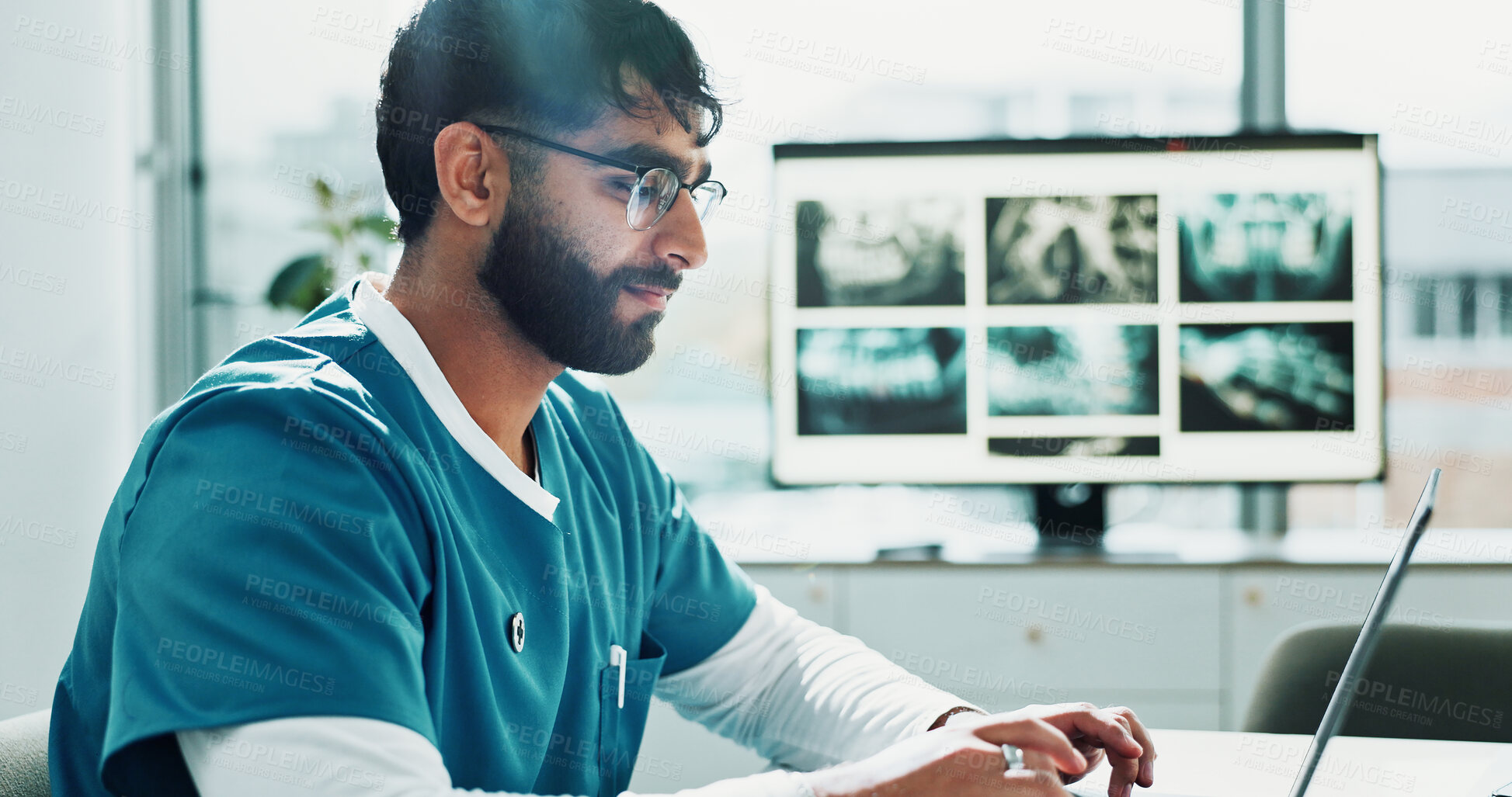 Buy stock photo Reading, doctor and man with laptop in clinic, surgery preparation and review for medical procedure. Research, operation planning and surgeon with pc for technique revision, smile and patient record