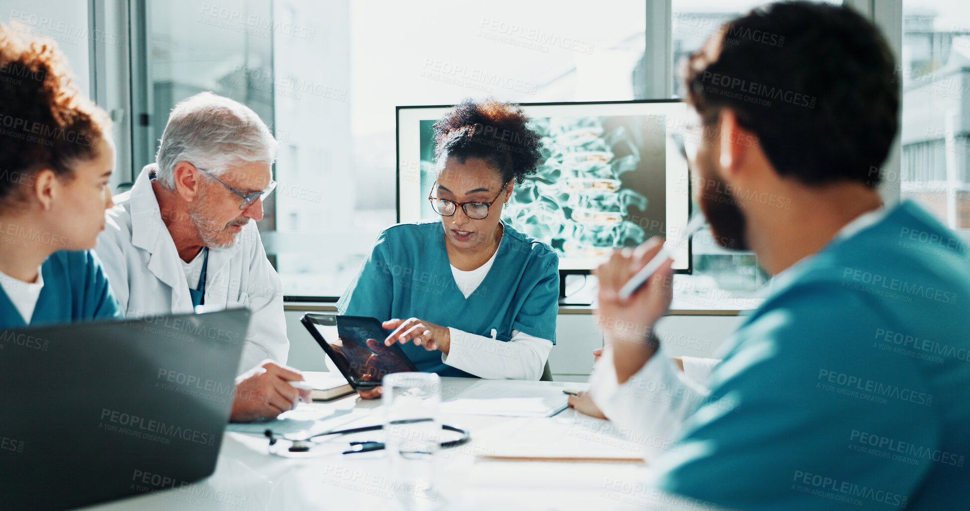 Buy stock photo Doctor, nurses and meeting in hospital with tablet, discussion and collaboration for medical research. Healthcare worker, people and brainstorming with tech, explain idea or suggestion for diagnosis.