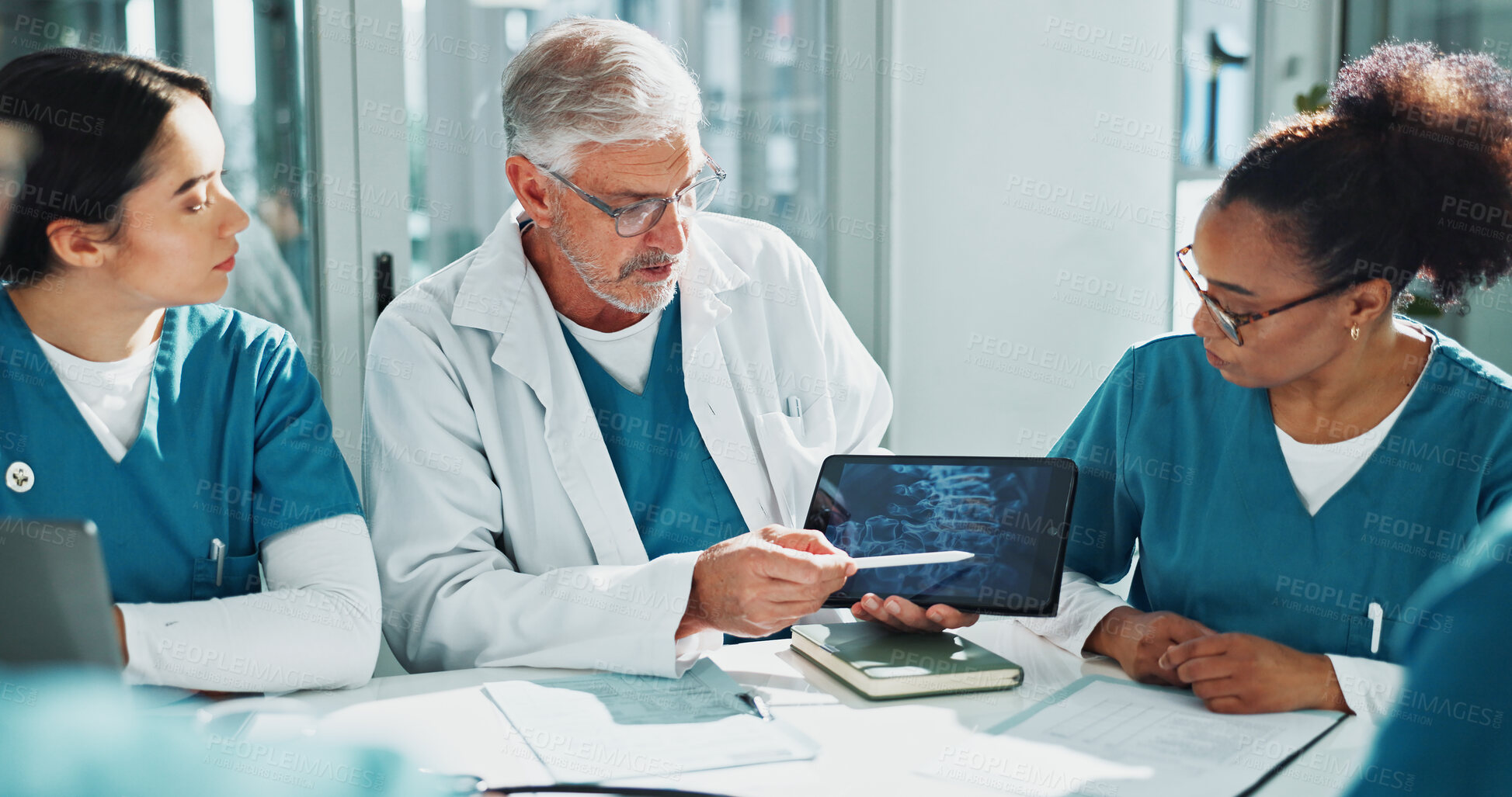 Buy stock photo Doctor, nurses and x ray in hospital with tablet screen, discussion or medical research for diagnosis. Healthcare worker, people and brainstorming with tech, bones scan or explain idea for case study
