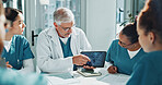 Doctor, nurse and x ray in meeting with tablet screen, training team or medical research for diagnosis. Healthcare worker, people and teaching in hospital with tech, scan or discussion for case study
