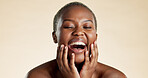 Black woman, laugh and beauty with skincare in studio background for shine, self care and aesthetic. Space, female person and humor with cosmetics for clear skin, facial dermatology and natural glow