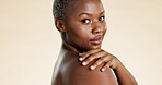 Portrait, skincare or black woman with shoulder touch, soft texture or exfoliation for natural shine. Space, wellness or happy person with dermatology for body care, smooth skin and studio background