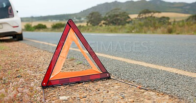 Buy stock photo Roadside, warning and triangle for travel caution for attention, accident and safety precaution. Danger, sign and hazard symbol for transport emergency, deserted road and signal for traffic control
