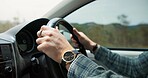 Person, hands and driver with car for road trip, travel or commute on street in countryside. Traveler, transportation or driving steering wheel in vehicle for outdoor journey, adventure or ride