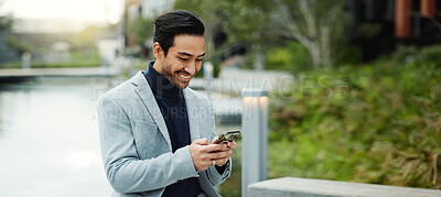 Buy stock photo Businessman, smile and scroll in city with phone, notification and email for real estate opportunity. Banner, space and person in town with tech, text message or realtor update for urban development.