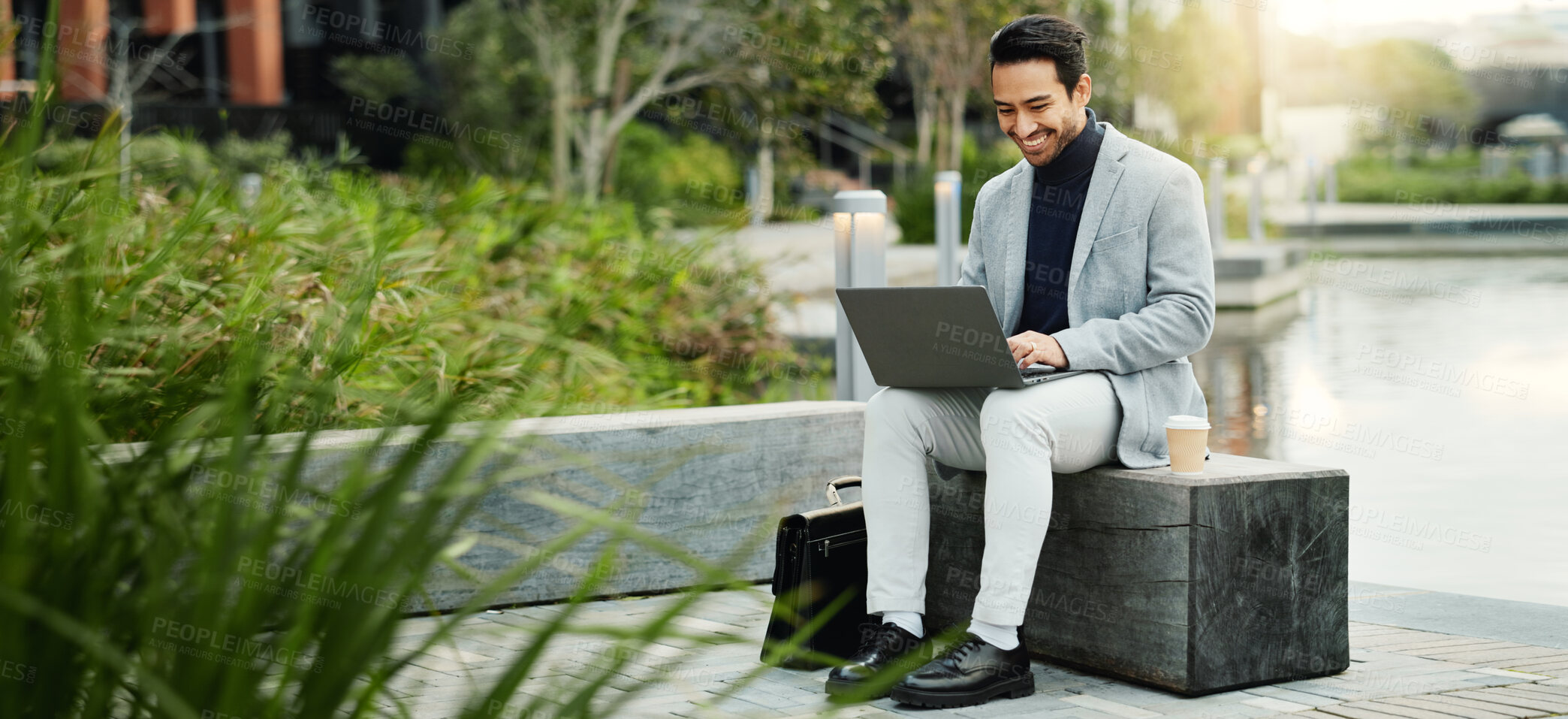 Buy stock photo Businessman, smile and typing in city with laptop, browsing website and email for real estate listing. Happy, person and realtor outdoor with computer, review property online and urban development.