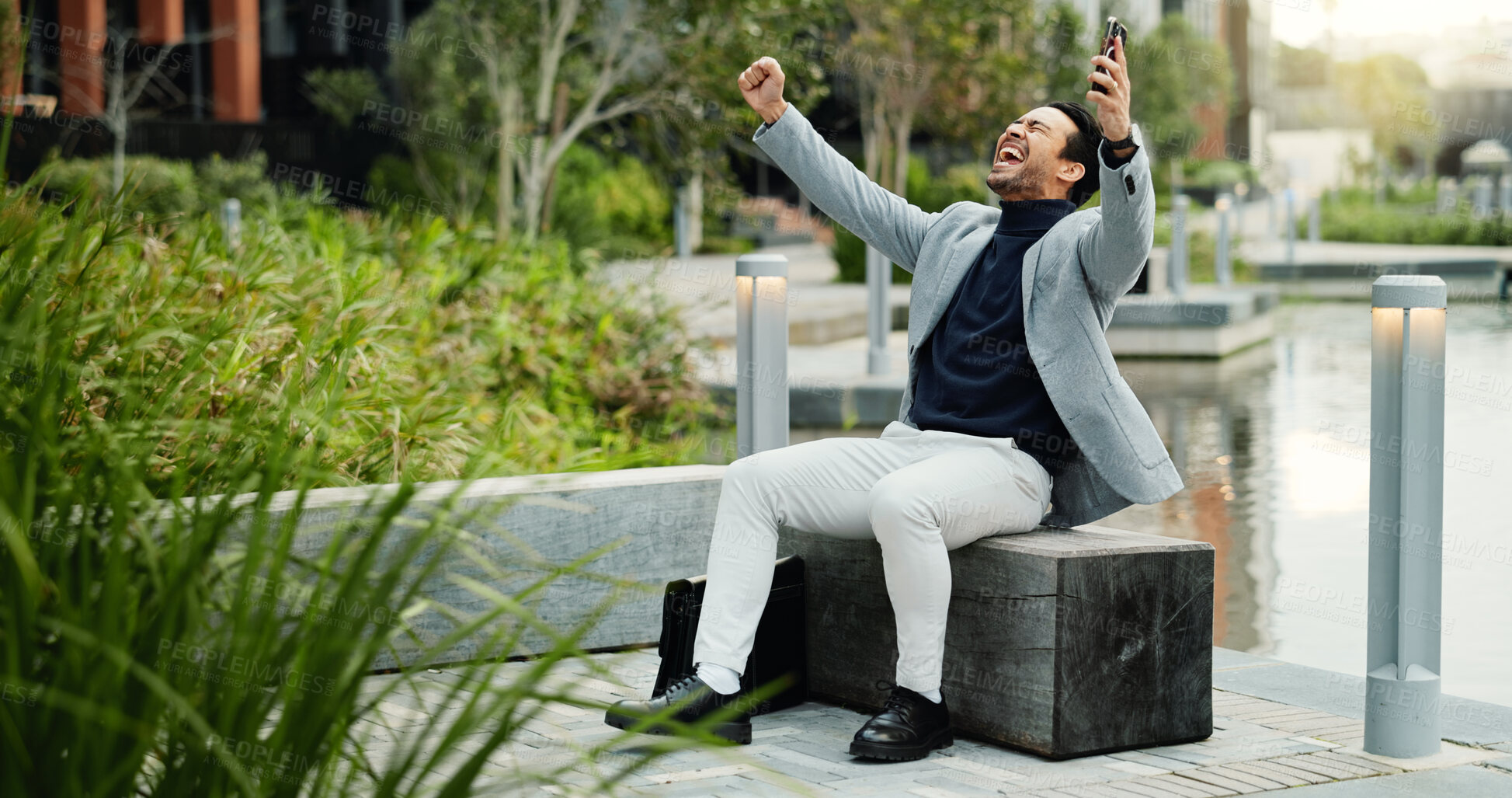 Buy stock photo Excited, businessman and celebration with phone in city, achievement or happy for sales notification. Outdoor, account manager and person with smile for win, revenue growth and cheering with mobile