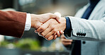 Meeting, business people and handshake for deal in city, lawsuit mediation and settlement agreement. Town, cooperation and lawyers shaking hands for compromise, client negotiation and case resolution
