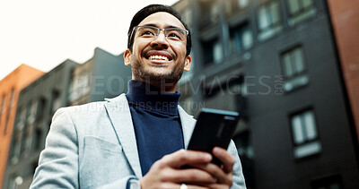 Buy stock photo Businessman, thinking and phone in city with smile, travel or search for urban development. Property investor, tech or low angle in town for economy info, schedule or happy for investment opportunity