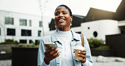 Buy stock photo Coffee, thinking and black woman in city with earphones for music, audio and song on morning commute. Happy, travel and person walking with cellphone listening to radio, podcast and playlist for work