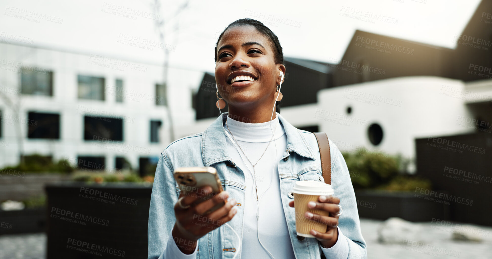 Buy stock photo Coffee, thinking and black woman in city with earphones for music, audio and song on morning commute. Happy, travel and person walking with cellphone listening to radio, podcast and playlist for work
