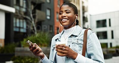 Buy stock photo Walking, business and happy woman in city with earphones for music, travel and morning commute. Coffee, worker and African person with cellphone for streaming audio, podcast and playlist in town