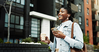 Buy stock photo Happy, black woman or travel with coffee, phone or music in city for morning commute to work. Female person, traveler or smile with earphones, beverage or smartphone for audio streaming in urban town