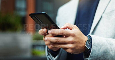 Buy stock photo Typing, hands and businessman in city with phone for chat, email and financial advice outdoor. Corporate, online and person on cellphone for contact, message and client update for investment in town