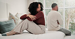 Conflict, upset and couple on bed in home with toxic relationship, cheating or disagreement. Fighting, divorce and man with woman in bedroom for marriage problem, affair or argument in house.